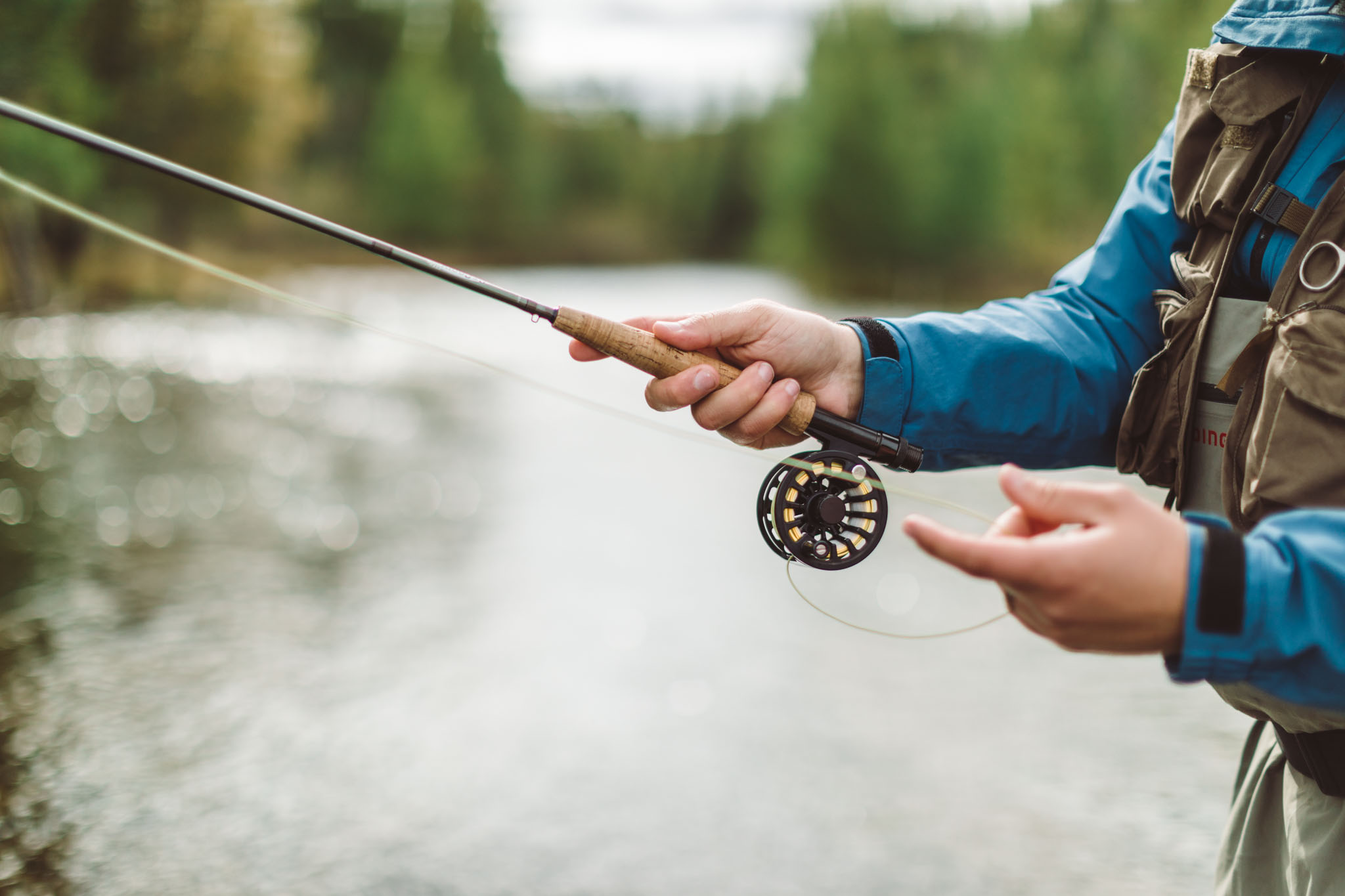 Fly fishing lifestyle product photography. Fishing with flyrod.