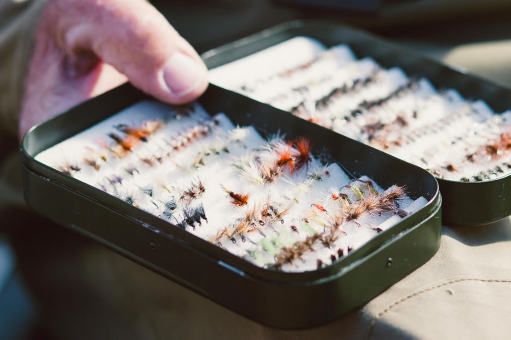 Editorial photography for Des Moines Register Newspaper showing mans box of flies.