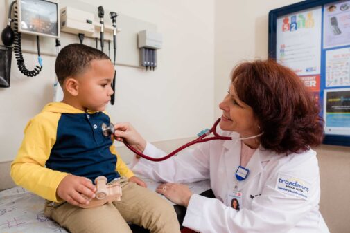 doctor working with child patient